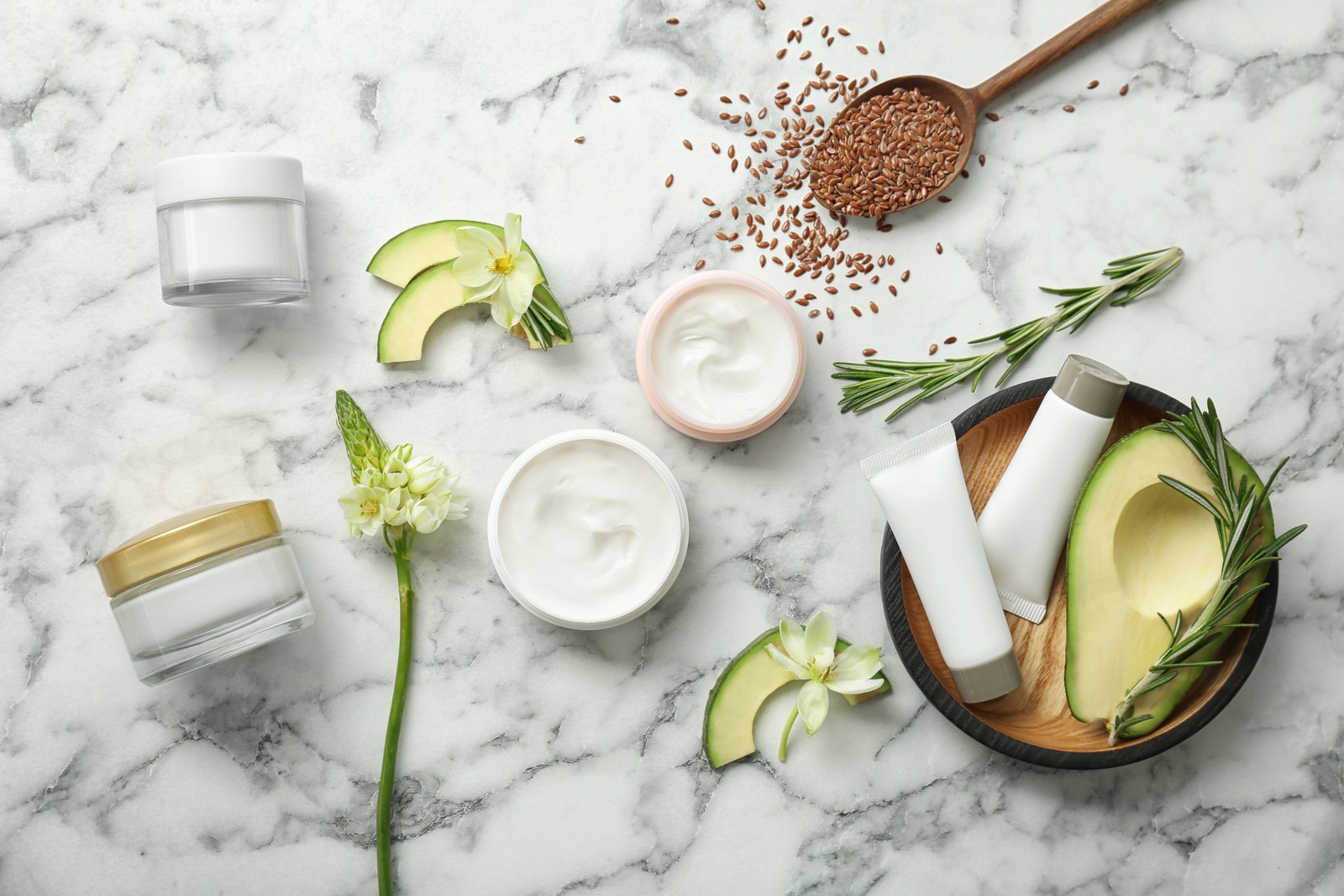 Photo of beautiful composition with cosmetics on light background, flat lay