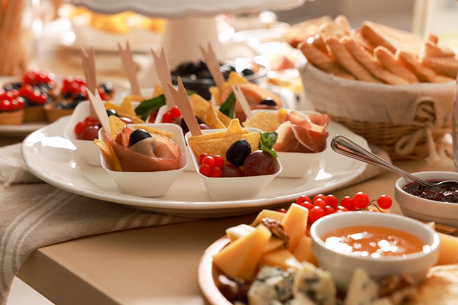 Photo of dishes with different food on table indoors. Luxury brunch