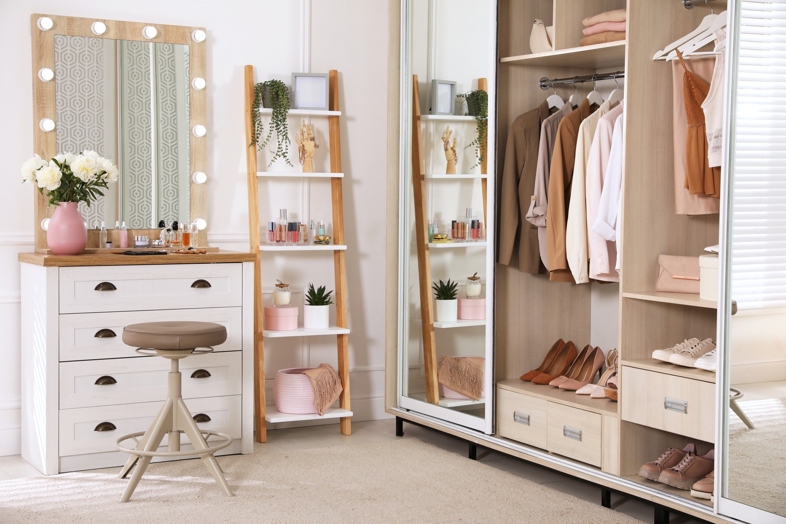 Photo of elegant room with dressing table and wardrobe. Interior design